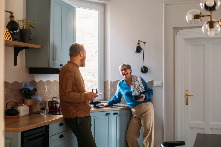 man-and-woman-laughing-in-kitchen.jpg