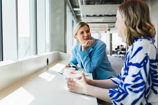 Flagstone Business Savings Accounts Two Women Meeting At Work