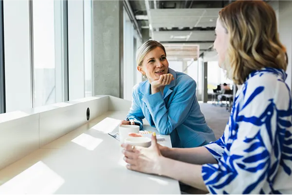 Flagstone Business Savings Accounts Two Women Meeting At Work