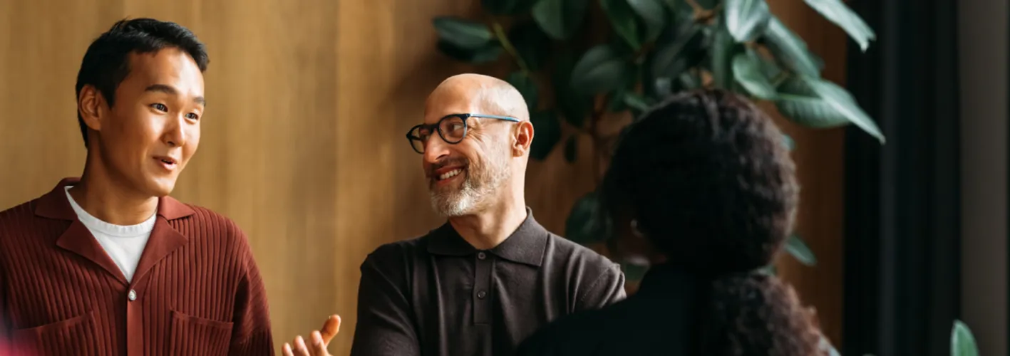 Colleagues talking at work