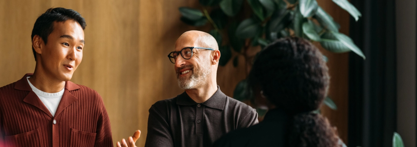 Colleagues talking at work